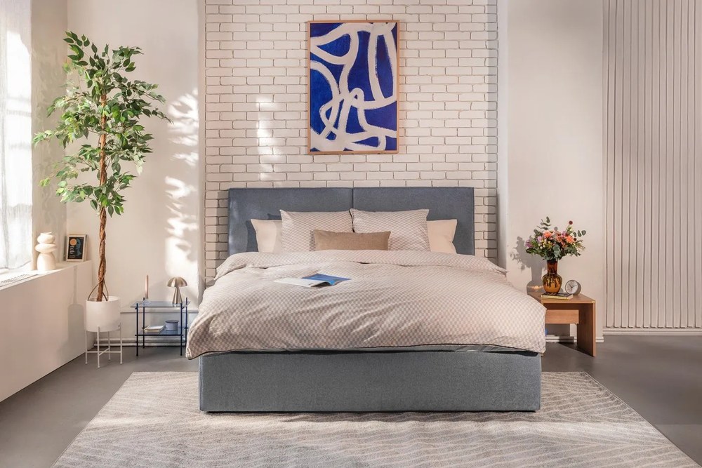 Kék kárpitozott ágyneműtartós franciaágy ágyráccsal 180x200 cm Thessa Bold – Bonami Selection