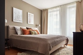 Bézs kárpitozott ágyneműtartós franciaágy ágyráccsal 180x200 cm Lotte – Meise Möbel