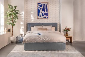 Kék kárpitozott ágyneműtartós franciaágy ágyráccsal 180x200 cm Thessa Bold – Bonami Selection