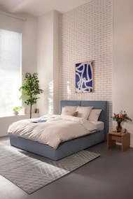 Kék kárpitozott ágyneműtartós franciaágy ágyráccsal 180x200 cm Thessa Bold – Bonami Selection