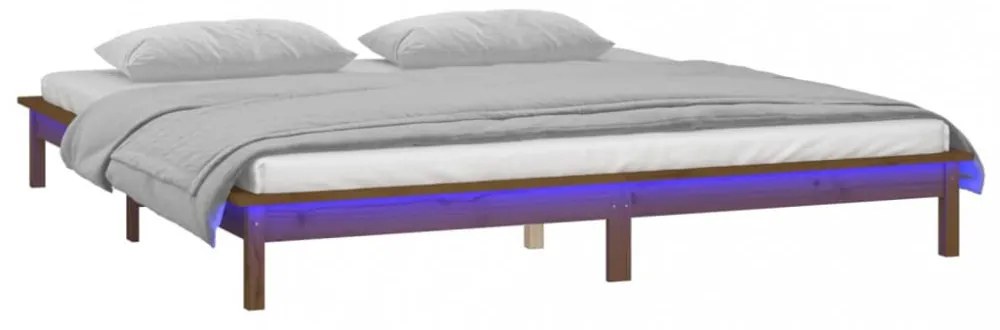 kis kétszemélyes mézbarna tömör fa LED-es ágykeret 120 x 190 cm