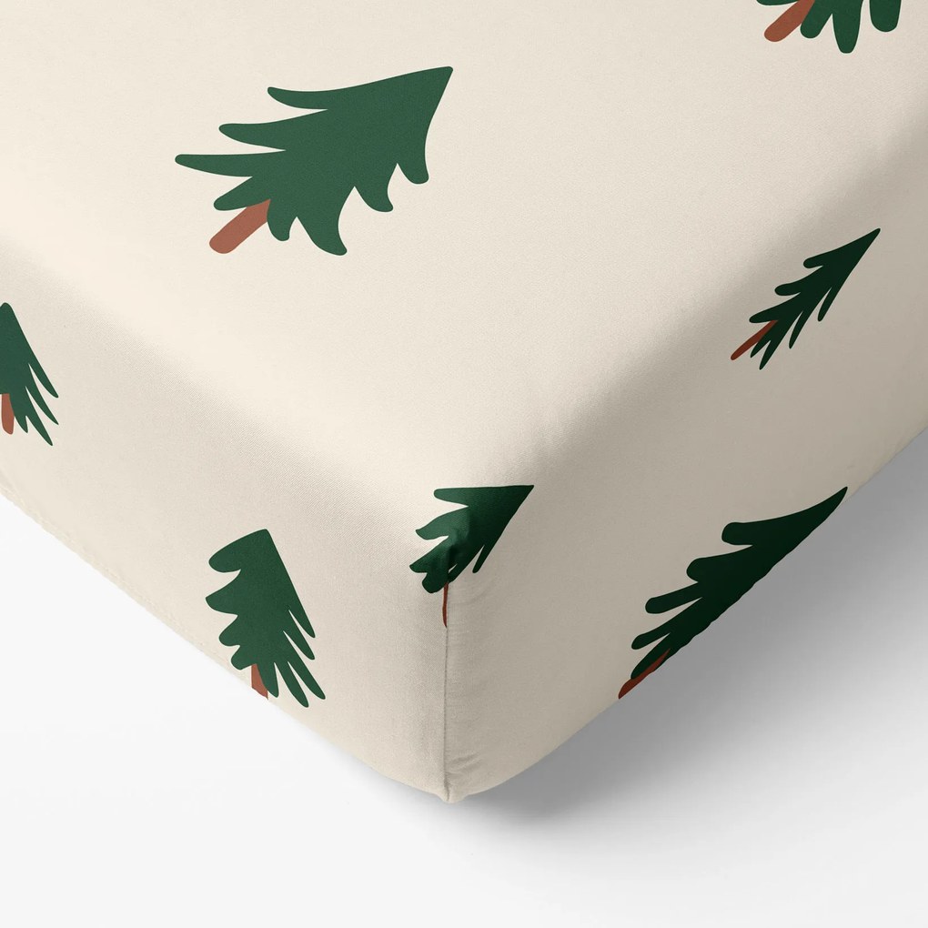 Goldea körgumis pamut lepedő - fenyőfák natúr alapon 180 x 200 cm