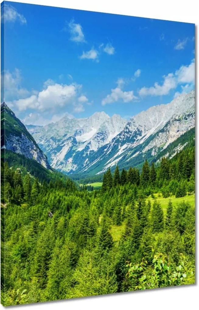 Vászonkép 60x80 Hegyi táj gyönyörű felhőkkel