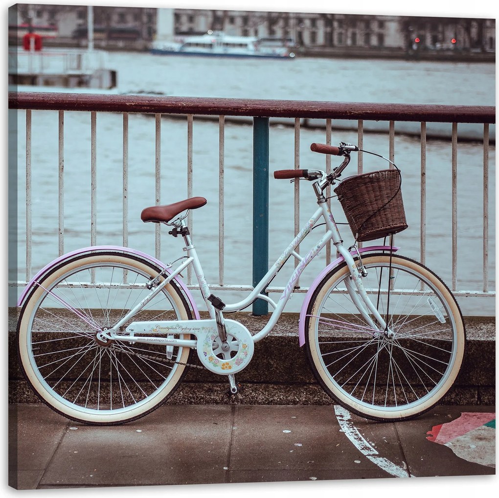 Vintage kerékpár a városban a hídnál vászonkép 90x90