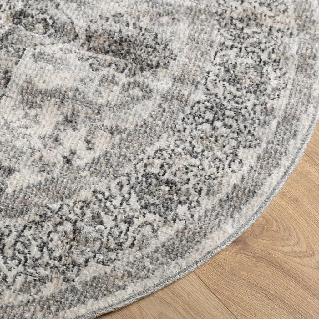 ARBIZU többszínű vintage stílusú bel-/kültéri szőnyeg Ø 120 cm