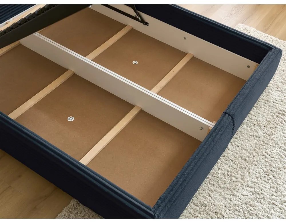 Sötétkék kárpitozott ágyneműtartós franciaágy ágyráccsal 160x200 cm Jade – Bobochic Paris