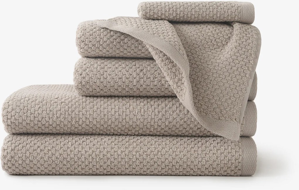 Goldea pamut frotír törölköző / fürdőlepedő micro pure - szürkésbarna 70 x 140 cm