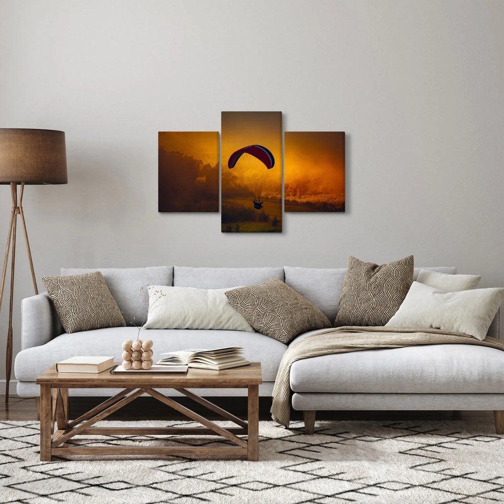 Ejtőernyős a naplementében képe (90x60 cm)