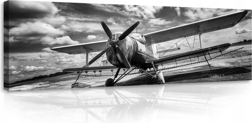 Vászonkép 145x45 Kétfedelű repülőgép retro felhők légi közlekedés