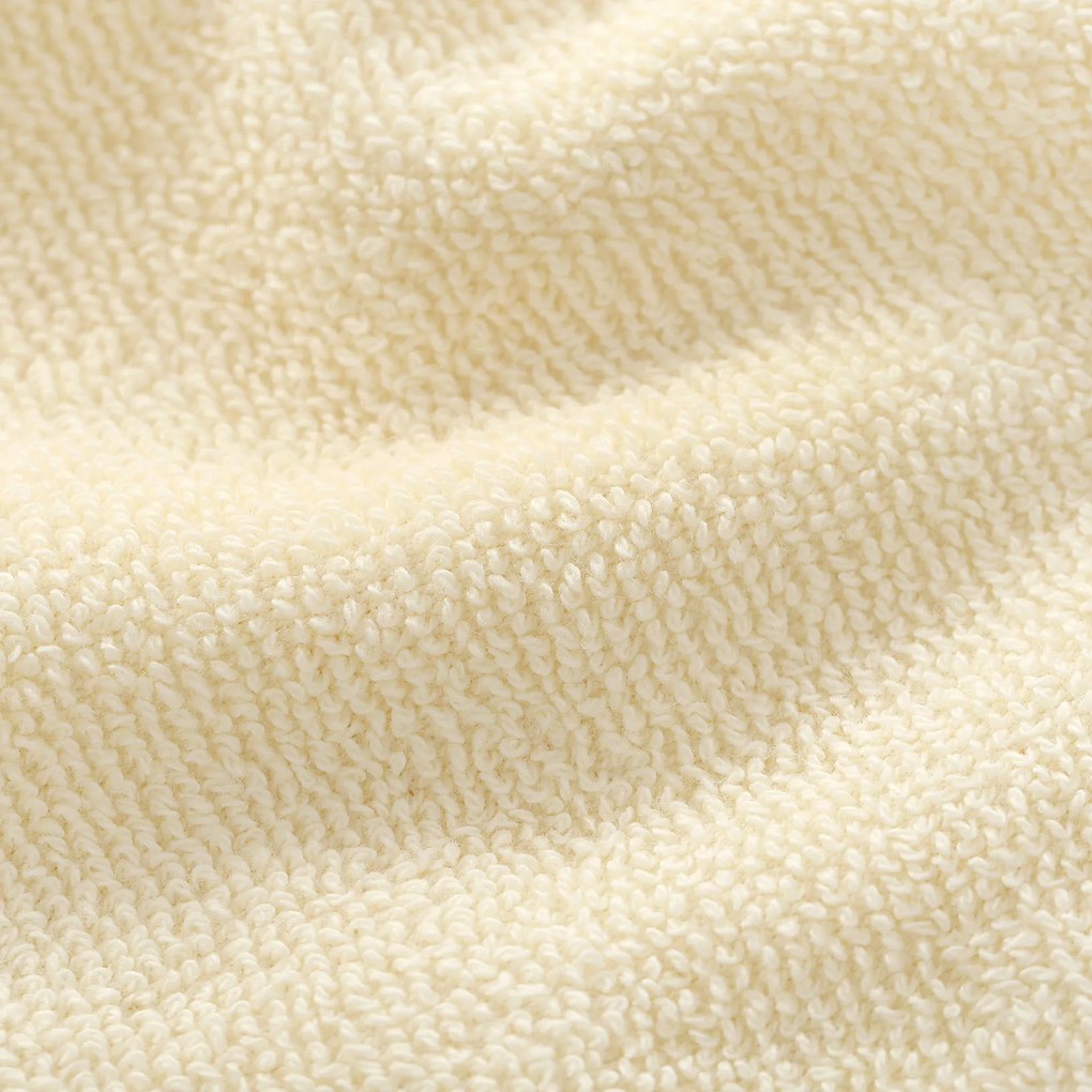 Goldea bordűr nélküli frottír törölköző és fürdőlepedő soft – krémszínű 30 x 50 cm