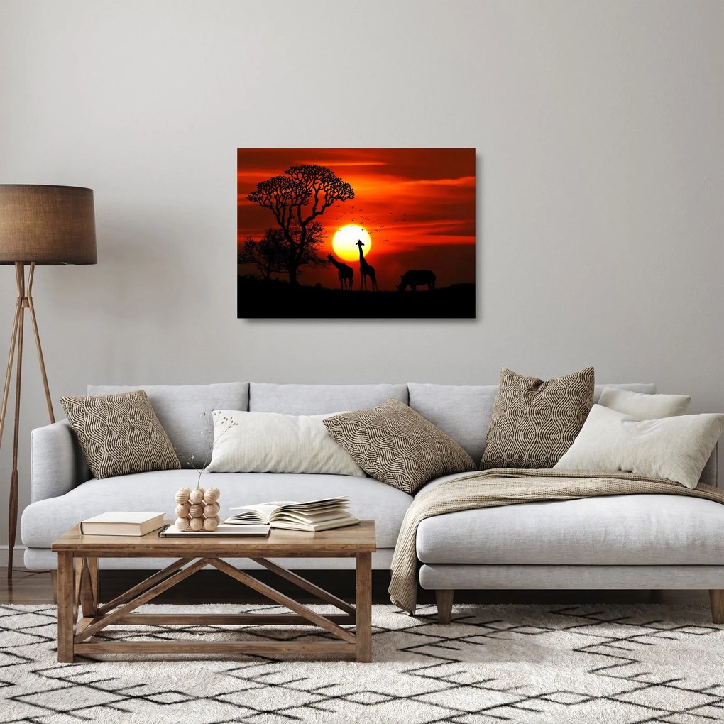 Kép - Állatok sziluettjei napnyugtakor (üvegen) (70x50 cm)