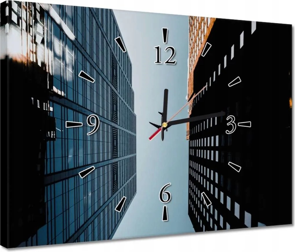 Falióra 40x30 Repülőgép az épületek között