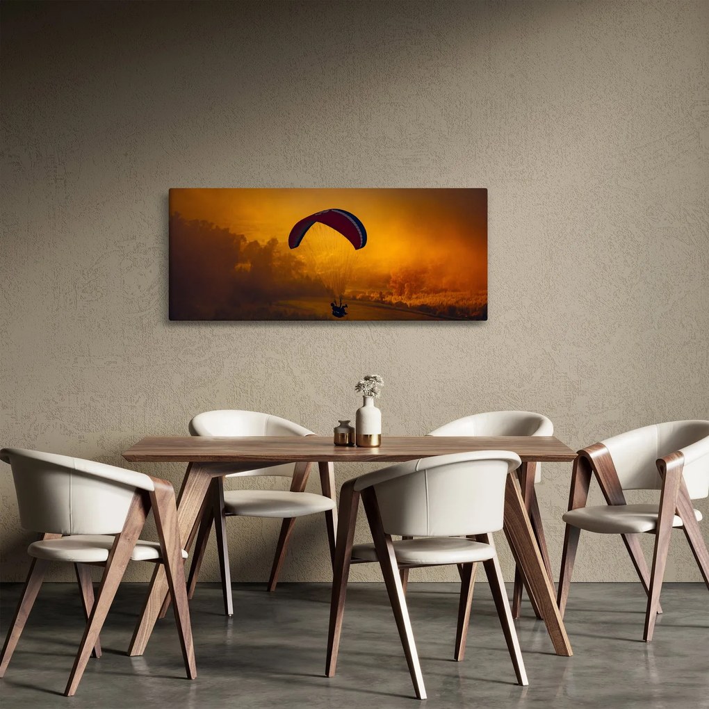 Ejtőernyős a naplementében képe (120x50 cm)
