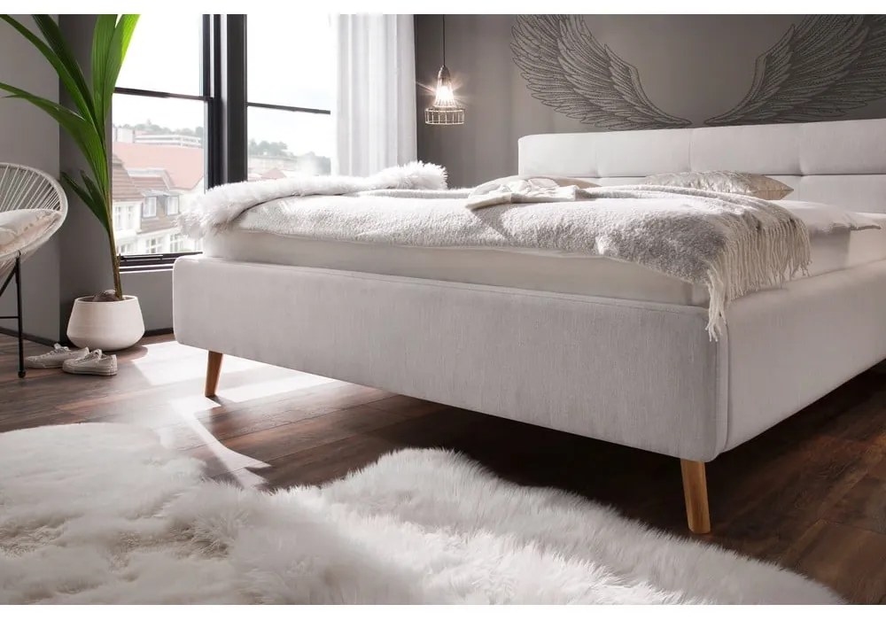 Világosszürke kárpitozott franciaágy tárolóhellyel ágyráccsal 180x200 cm Lotte – Meise Möbel