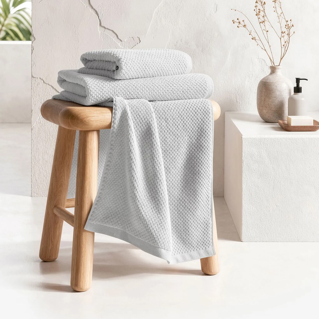 Goldea pamut frotír törölköző / fürdőlepedő micro pure - világosszürke 70 x 140 cm