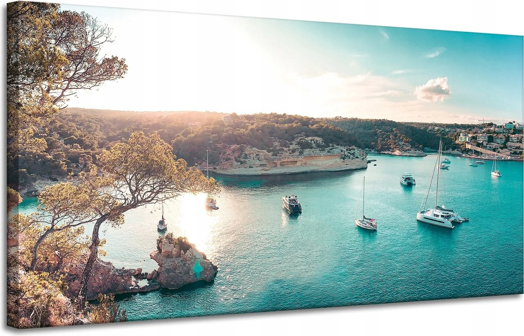 Vászonkép Víz a nap tükrében Csónakok Sziklák 120x60 cm