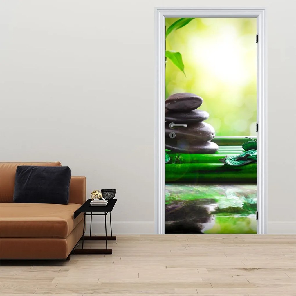 Fotótapéta ajtóra - Masszázs kövek és orchidea a vízen (95x205cm)