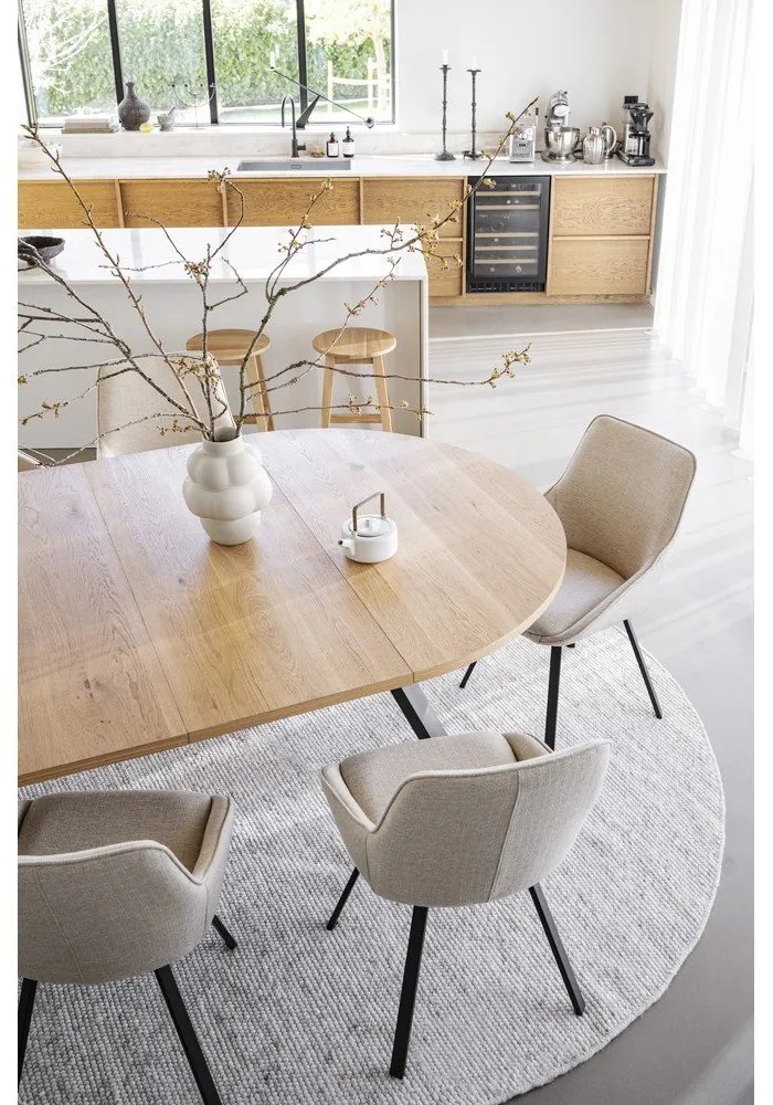 Natúr színű kerek bővíthető étkezőasztal tölgyfa dekorral ø 135 cm Maddock – Rowico