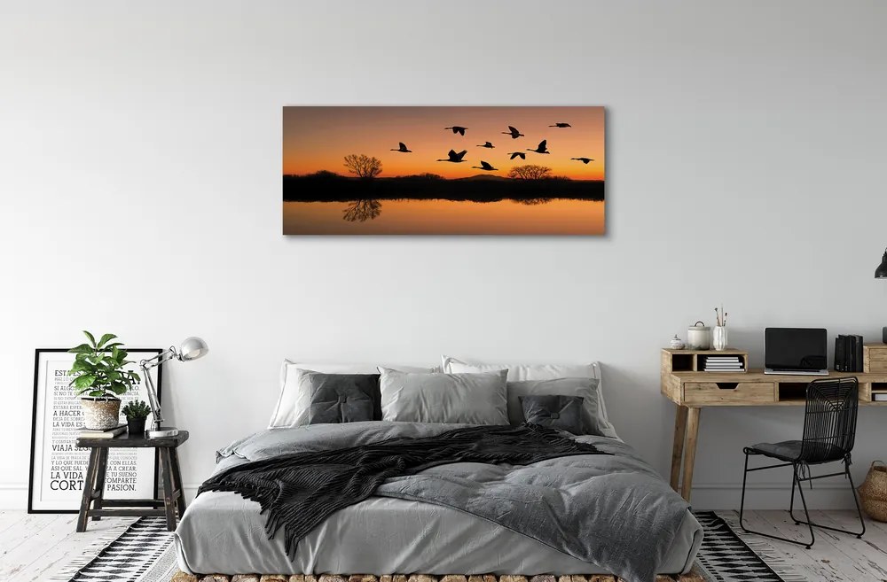 Canvas képek Repülő madarak naplemente 120x60 cm