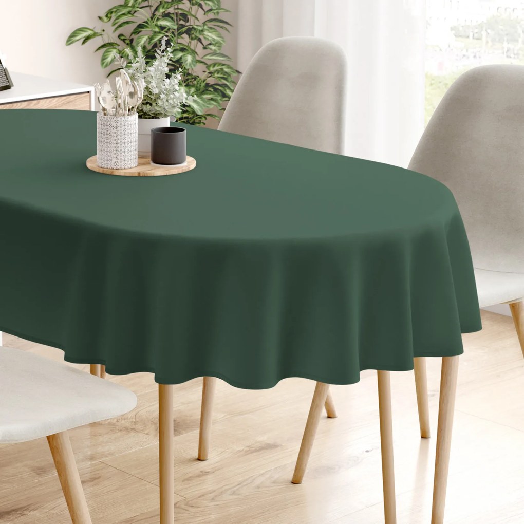 Goldea ovális karácsonyi pamut terítő - sötétzöld 120 x 200 cm