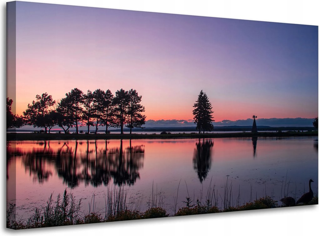 Vászonkép Naplemente a víz felett 100x60 cm