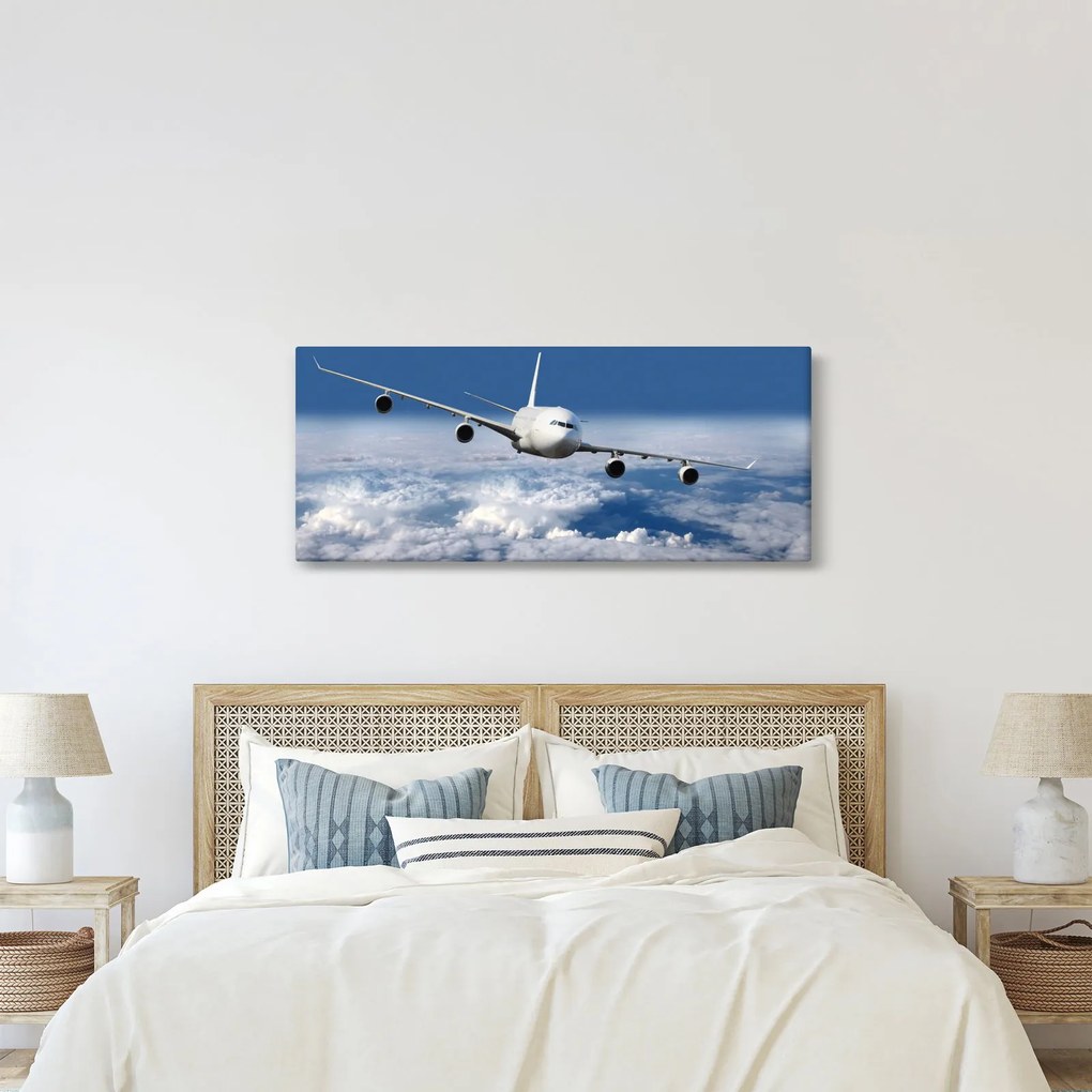 Kép - Repülőgép a felhőkben (120x50 cm)