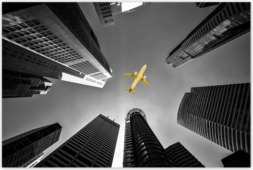 Poszterek 120x80 Sárga repülőgép a város felett