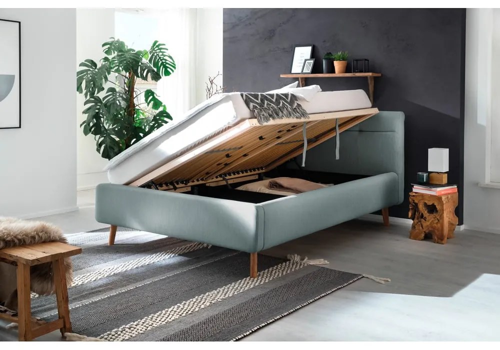 Világoskék kárpitozott ágyneműtartós franciaágy ágyráccsal 140x200 cm Lotte – Meise Möbel