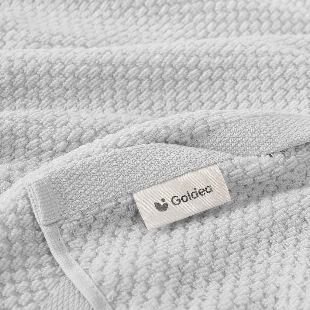 Goldea pamut frotír törölköző / fürdőlepedő micro pure - világosszürke 50 x 100 cm