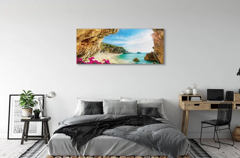 Canvas képek Görögország parti sziklák virágok 125x50 cm