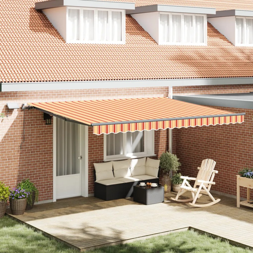 Kézi behúzható napernyő LED világítással sárga és narancs 450x300 cm