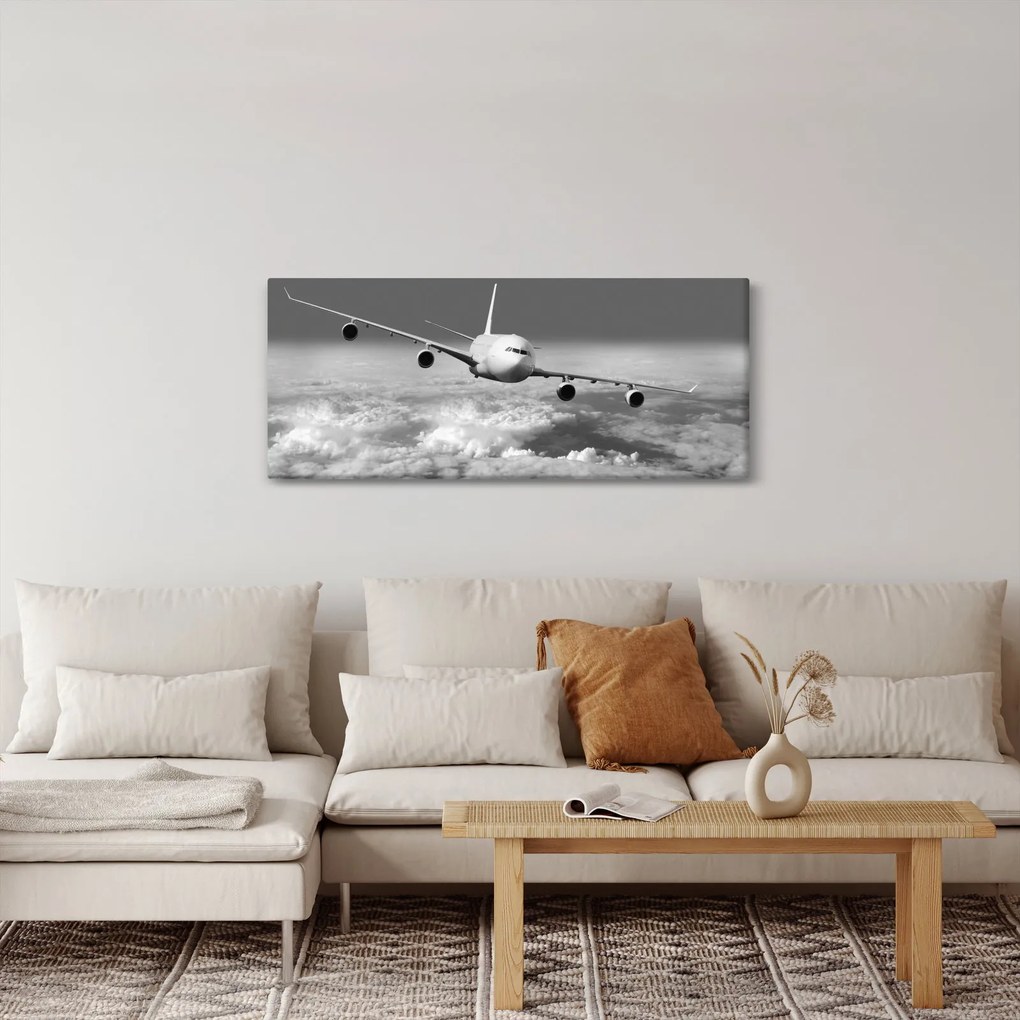 Kép - Repülőgép a felhőkben, fekete-fehér (120x50 cm)
