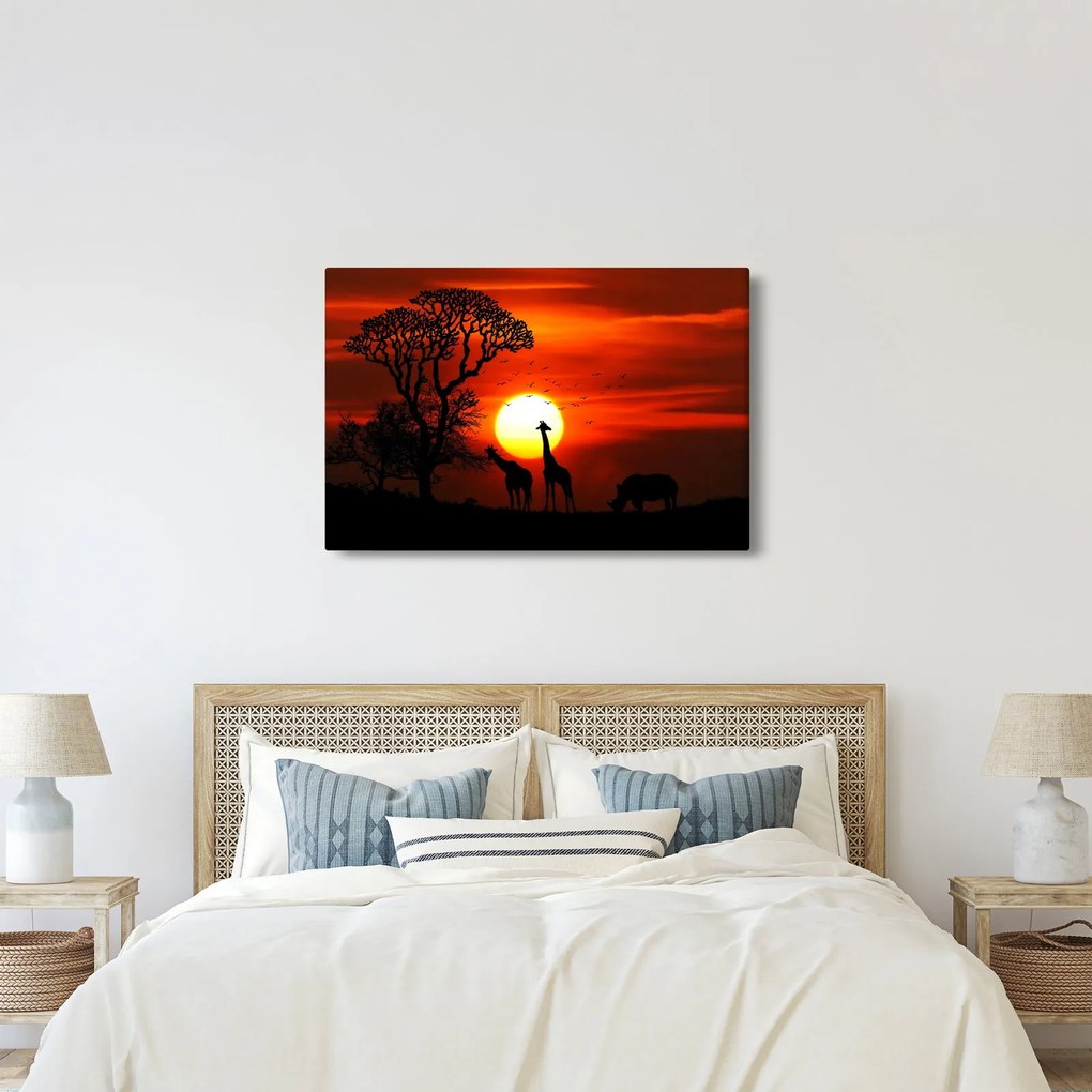 Kép - Állatok sziluettjei napnyugtakor (90x60 cm)