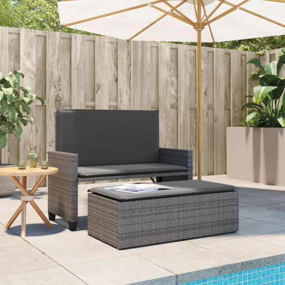 szürke polyrattan kerti pad párnával és lábtartóval