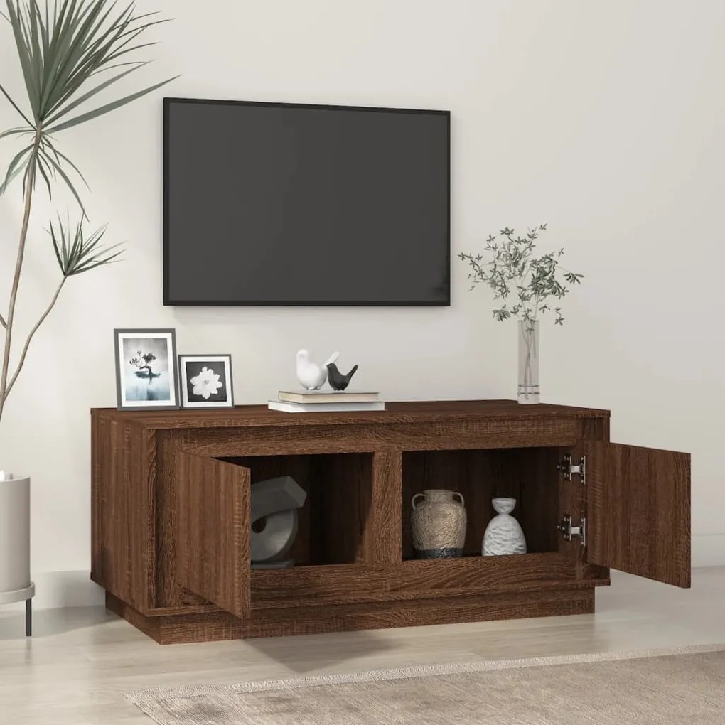 Barna tölgyszínű szerelt fa dohányzóasztal 102x50x44 cm