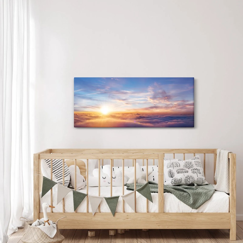 Kép - Naplemente a felhők felett (120x50 cm)
