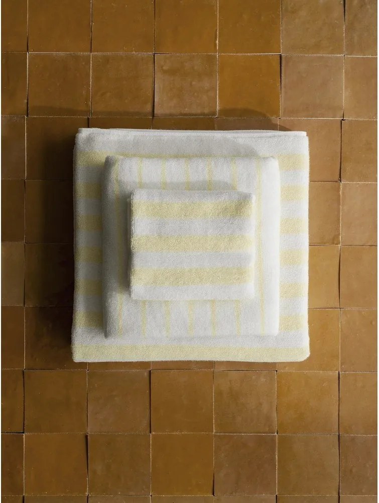 Világossárga-fehér frottír bio pamut fürdőlepedő 70x140 cm Arto – Blomus