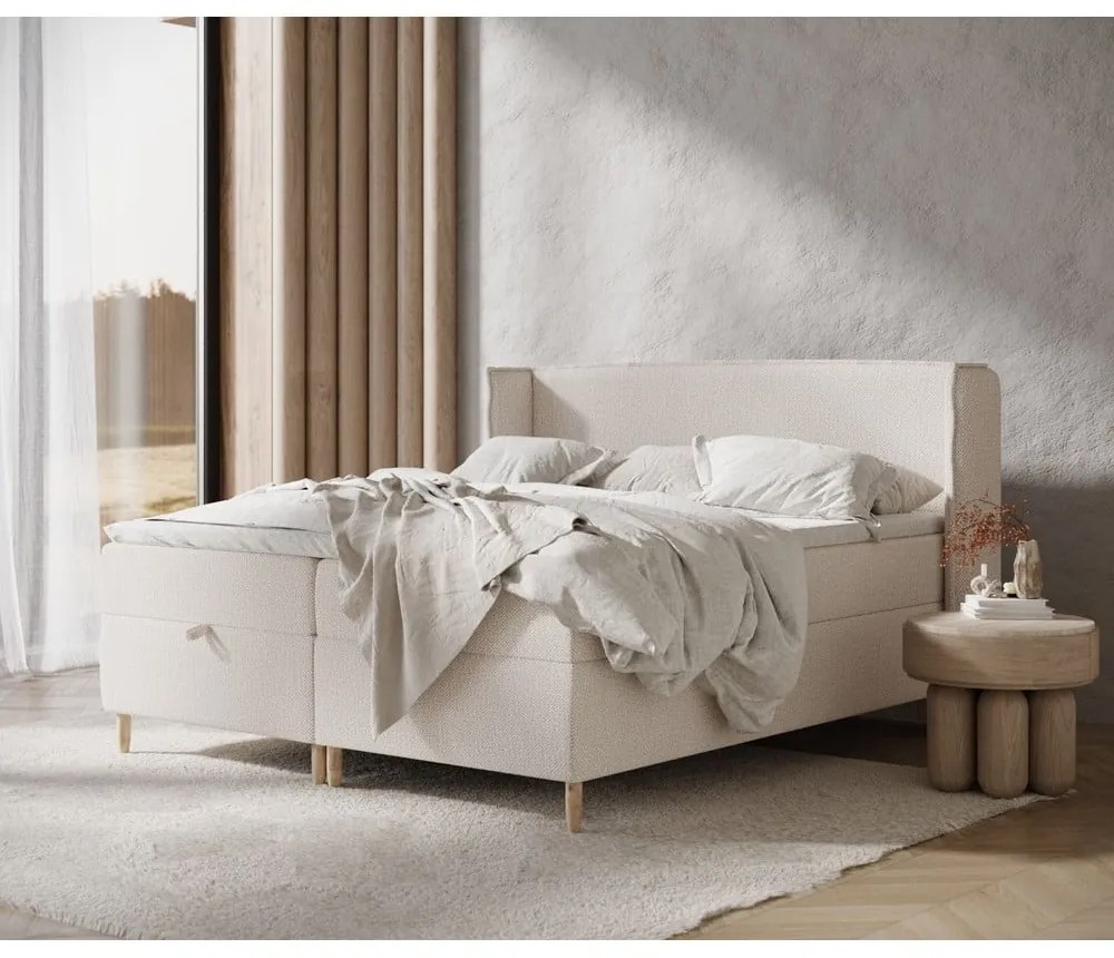 Krémszínű ágyneműtartós boxspring ágy 180x200 cm Monpelli – Maison de Rêve