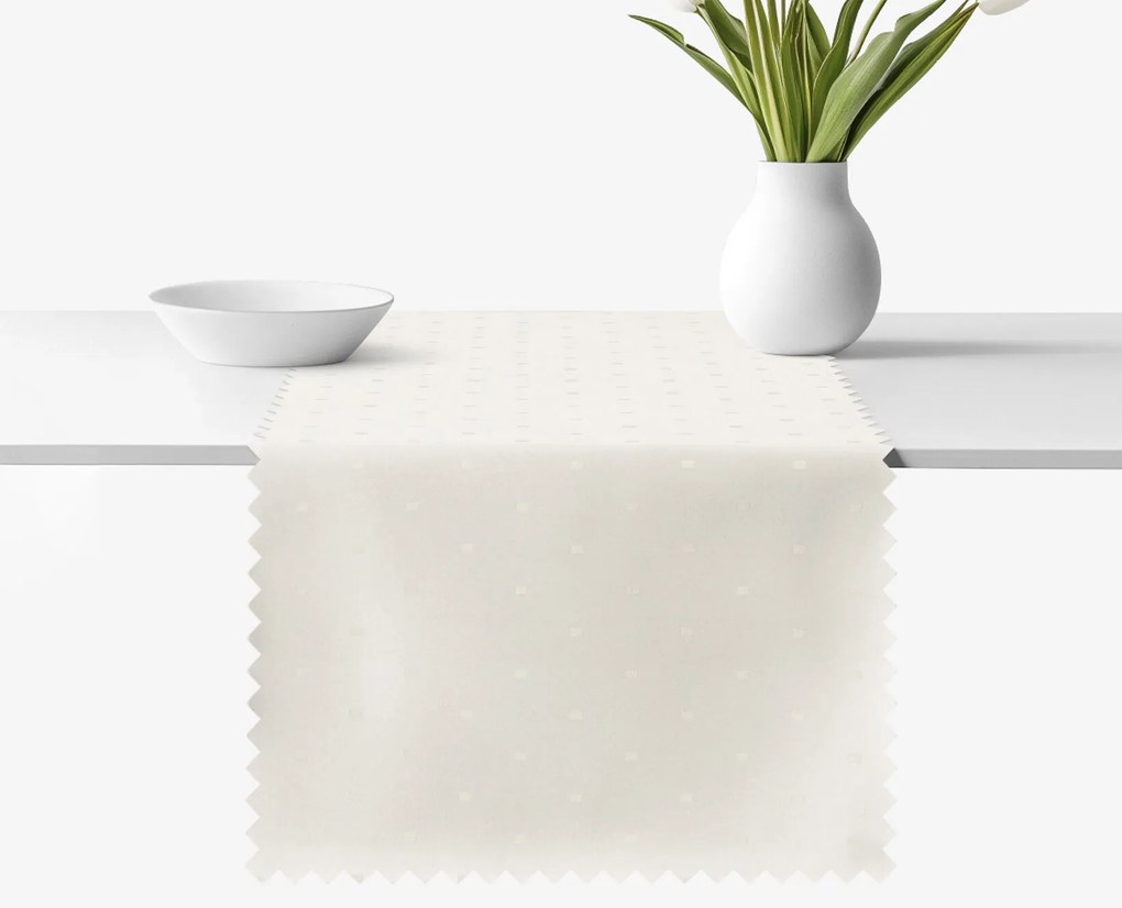 Goldea ünnepi teflonos asztali futó - tej színű alapon fényes négyzetek 35x120 cm