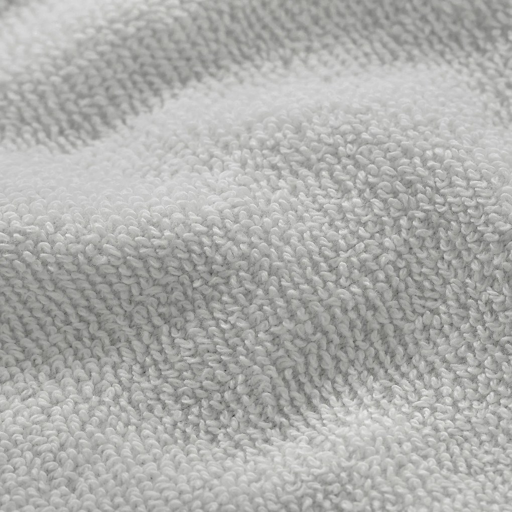 Goldea bordűr nélküli frottír törölköző és fürdőlepedő soft – szürke 50 x 100 cm