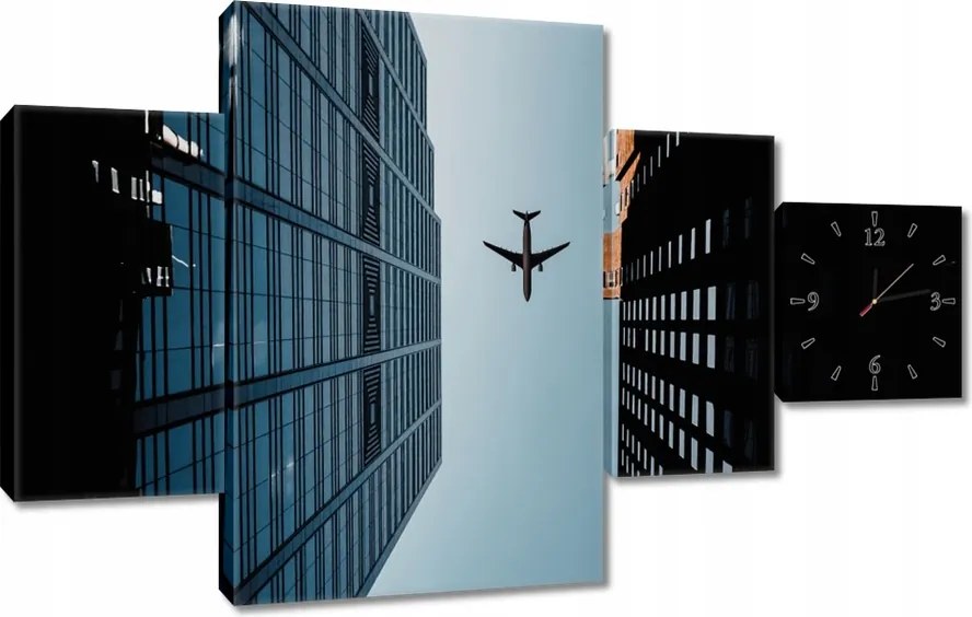 Faliórák 130x80 Repülőgép az épületek között