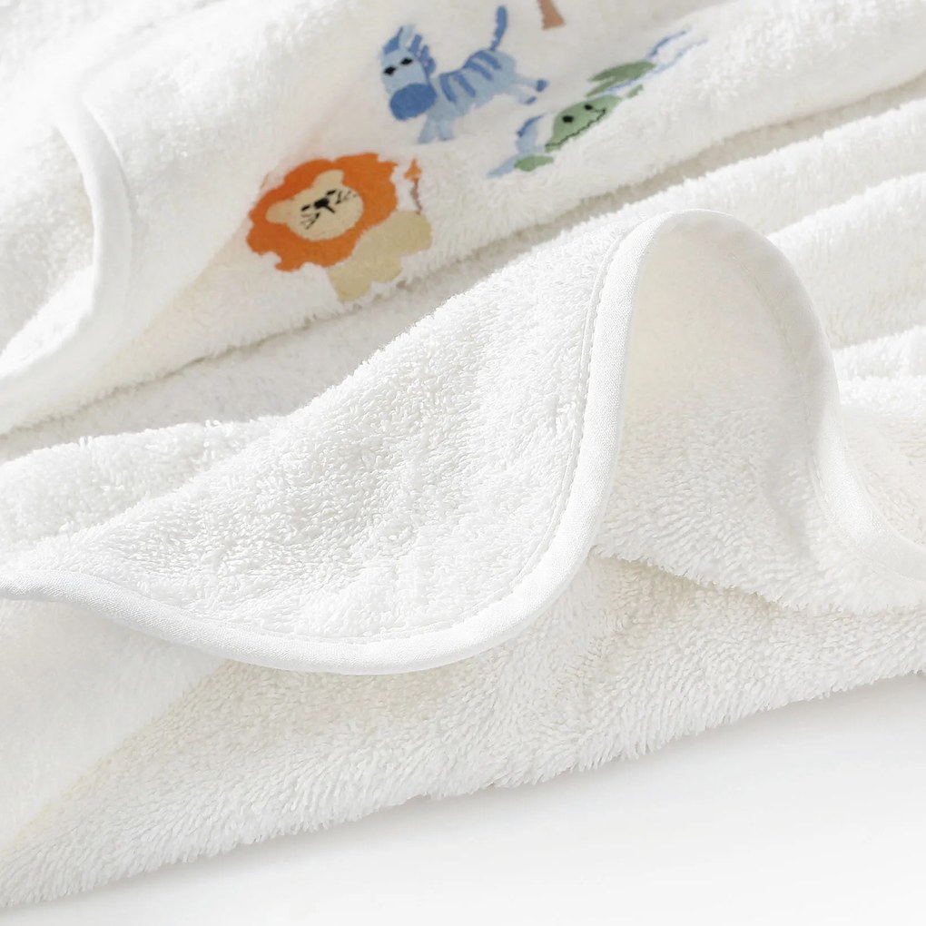 Goldea gyermek frottír fördőlepedő csuklyás - fehér alapon szafari 100 x 100 cm