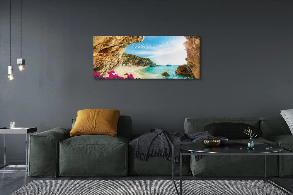 Canvas képek Görögország parti sziklák virágok 125x50 cm