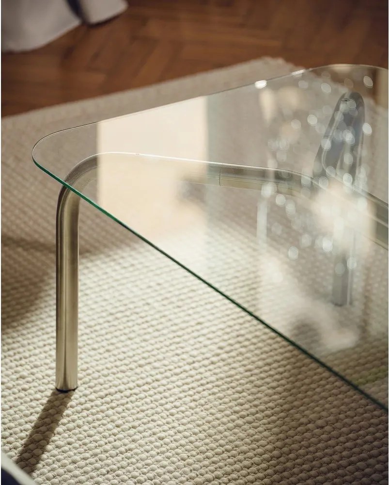 Ezüstszínű dohányzóasztal üveg asztallappal 60x110 cm Uku – noo.ma