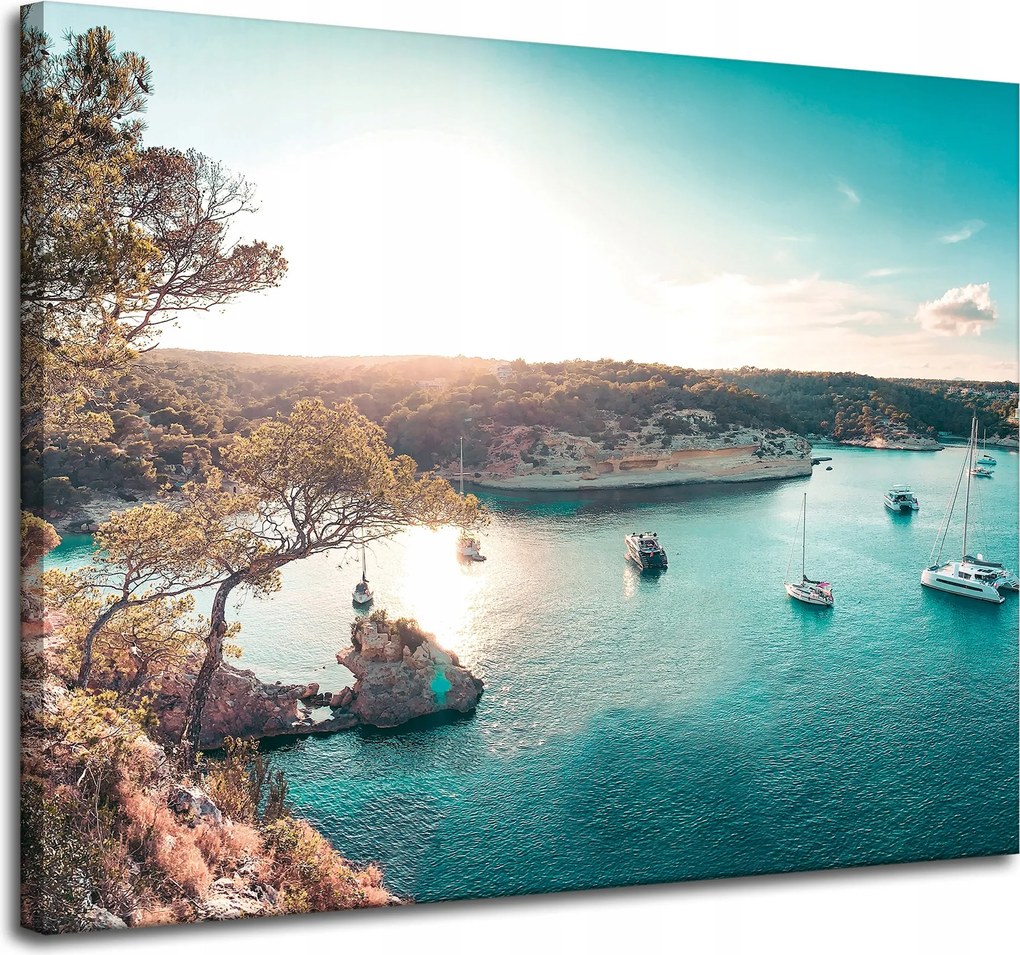 Vászonkép Víz a nap tükrében Csónakok Sziklák 100x80 cm