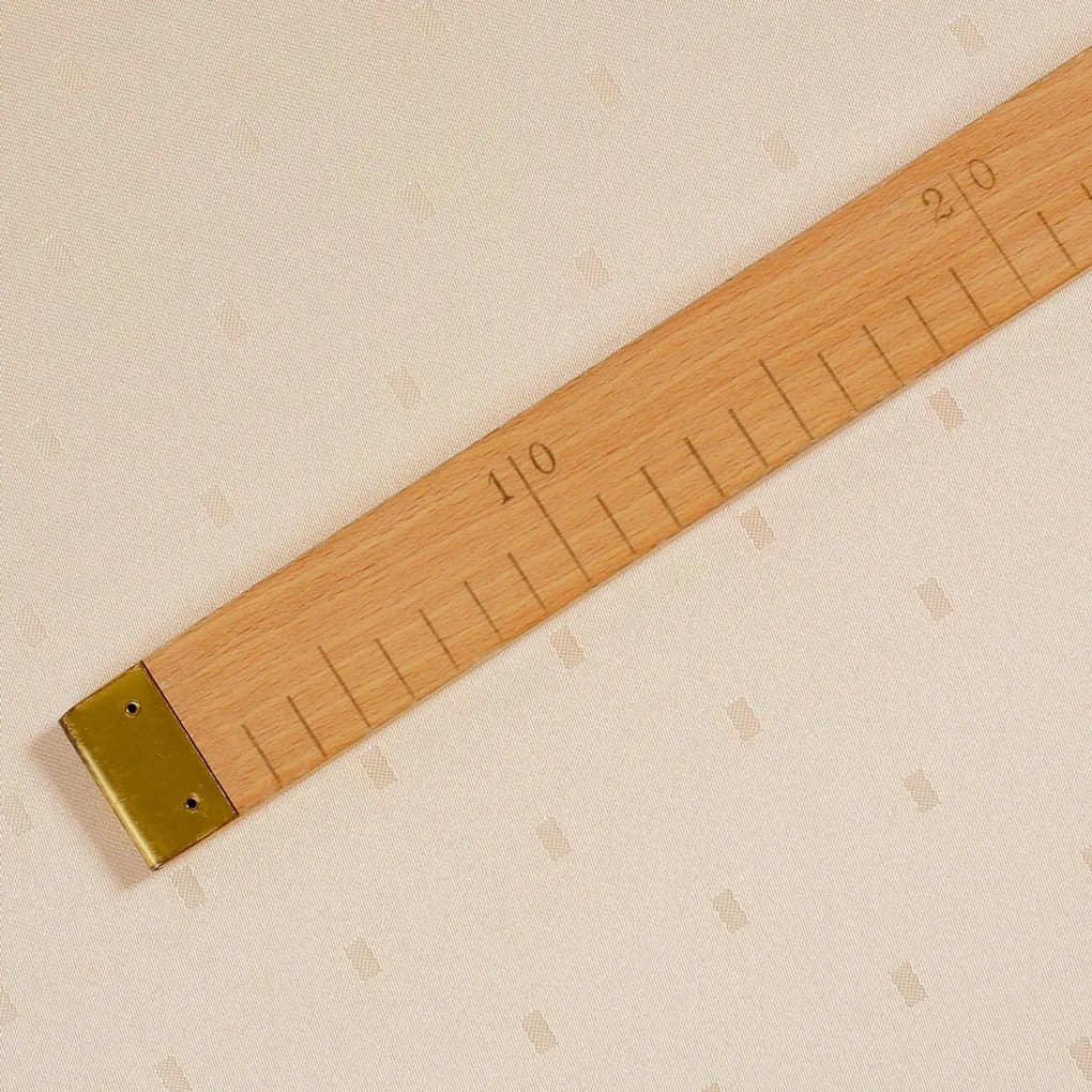 Goldea luxus teflon szövet terítőknek - pezsgő színű alapon fényes négyzetek 160 cm
