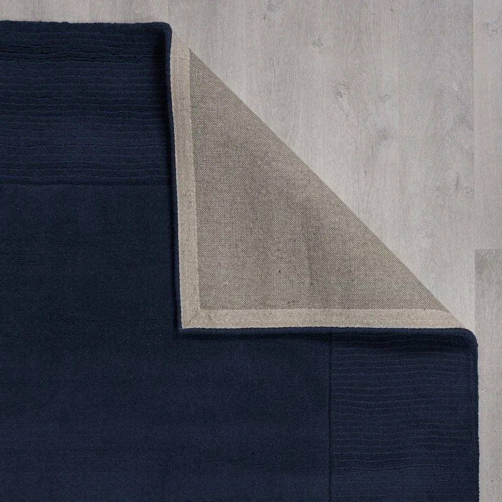 Sötétkék kézi szövésű gyapjú szőnyeg 160x230 cm Textured Wool Border – Flair Rugs
