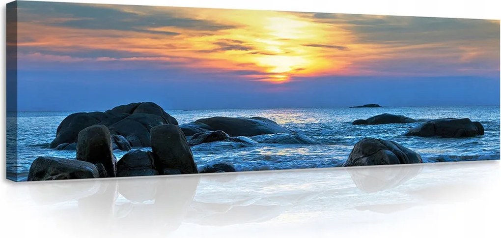 Vászonkép 145x45 Naplemente tenger tengerpart sziklák természet nyugalom harmónia