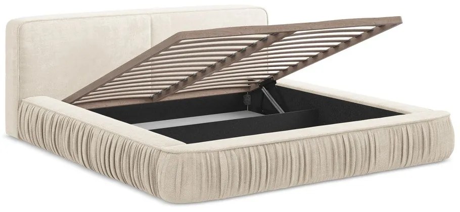 Krémszínű kárpitozott ágyneműtartós franciaágy ágyráccsal 180x200 cm Keoni – Makamii