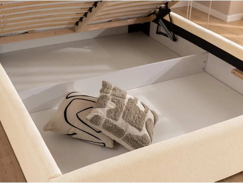 Krémszínű kárpitozott ágyneműtartós franciaágy ágyráccsal 140x200 cm Cille – Ropez